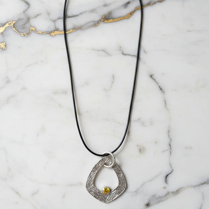 Artisan-Made Silver Necklace with Botanical Texture