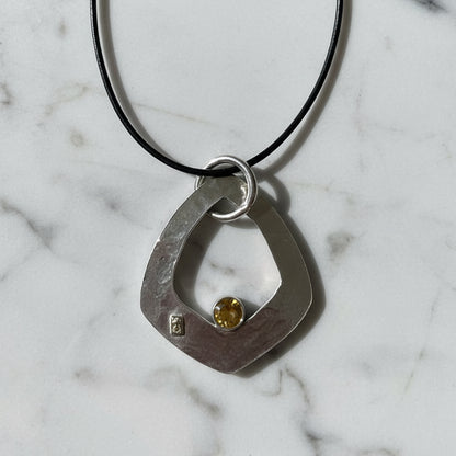 Artisan-Made Silver Necklace with Botanical Texture