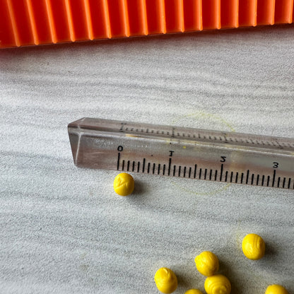 The BALLER polymer clay tiny petal bead ball making tool - Clay Revolution