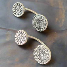 Carregar imagem no visualizador da galeria, Pair of silver floral earrings on a textured surface. Class with Carrie Story. Online or In Person