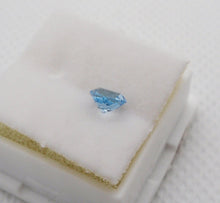 Load image into Gallery viewer, Blue Topaz 5mm Faceted - ClayRevolution